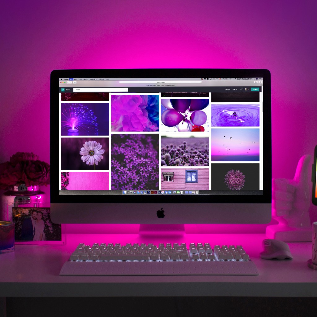 Creative desktop setup with a gallery screen